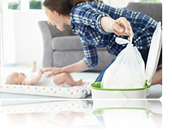 image: mother changing baby